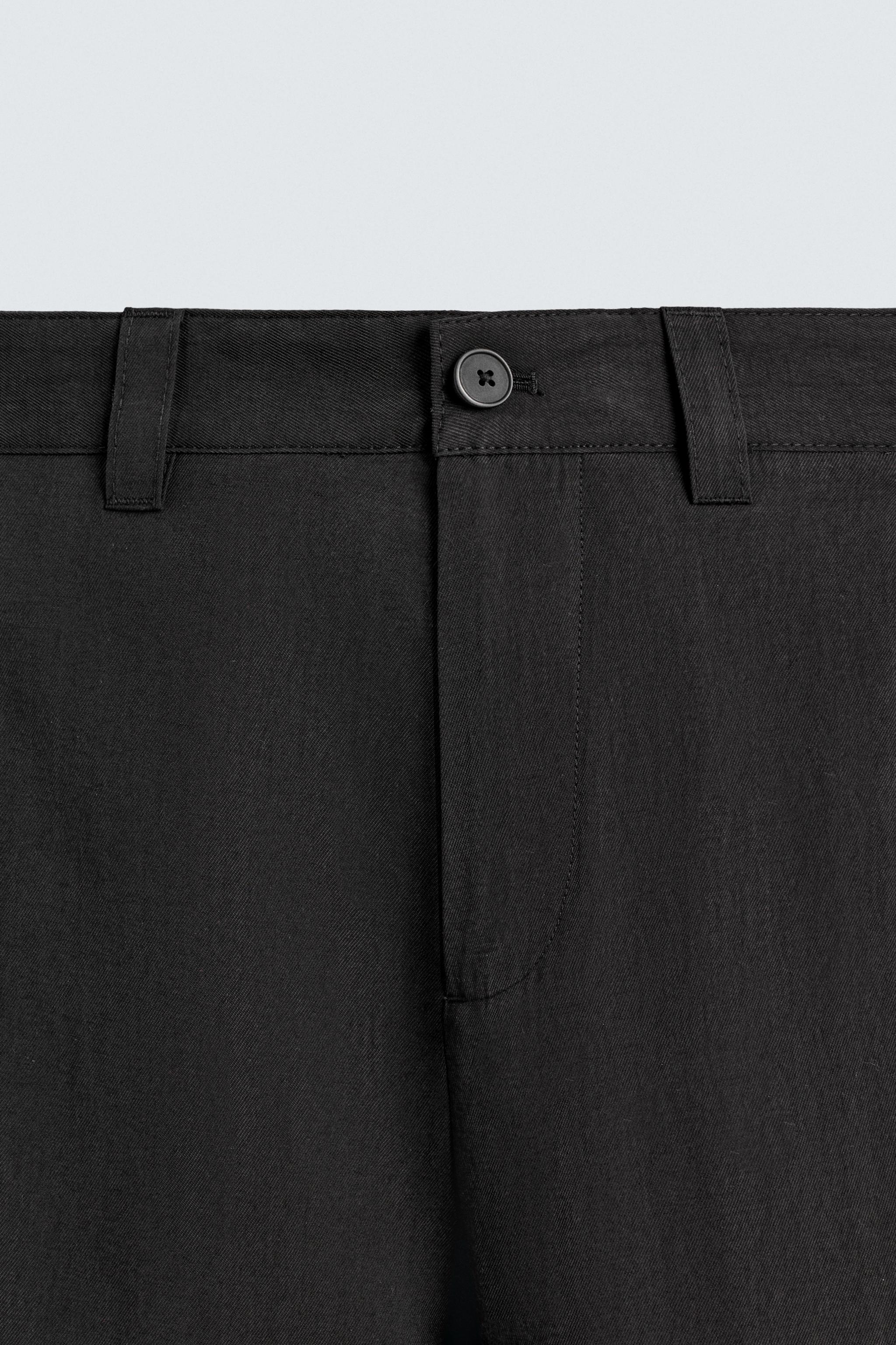FLOWY PLEATED PANTS